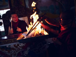 Thaye Dorje, His Holiness the 17th Gyalwa Karmapa, presides over a fire puja at His Eminence Beru Khyentse Rinpoche's guest house, India, December 2019. Photo / Tokpa Korlo