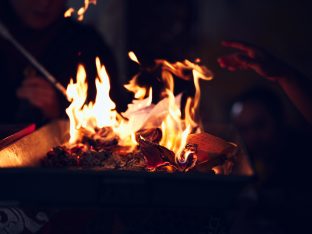 Thaye Dorje, His Holiness the 17th Gyalwa Karmapa, presides over a fire puja at His Eminence Beru Khyentse Rinpoche's guest house, India, December 2019. Photo / Tokpa Korlo