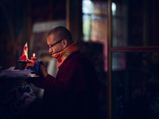 Thaye Dorje, His Holiness the 17th Gyalwa Karmapa, presides over a fire puja at His Eminence Beru Khyentse Rinpoche's guest house, India, December 2019. Photo / Tokpa Korlo