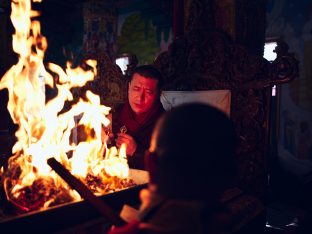 Thaye Dorje, His Holiness the 17th Gyalwa Karmapa, presides over a fire puja at His Eminence Beru Khyentse Rinpoche's guest house, India, December 2019. Photo / Tokpa Korlo