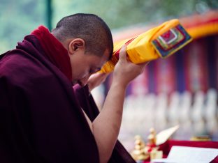 Thaye Dorje, His Holiness the 17th Gyalwa Karmapa, presides over prayers on the opening day of the Kagyu Monlam in Bodh Gaya, India, in December 2019 (Photo/Tokpa Korlo)