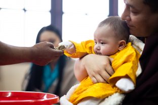 As Karmapa’s family entered the temple, there were offerings of mandala, ku sung thuk, tea and rice.