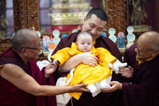 Smiles all round, as little Thugsey joins in proceedings on the final day of the Public Meditation Course at KIBI