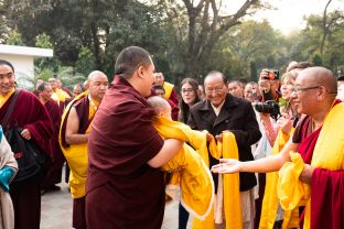 Thaye Dorje, His Holiness the 17th Gyalwa Karmapa, brings his son Thugsey with him to the Public Meditation Course at KIBI, to the delight of those present