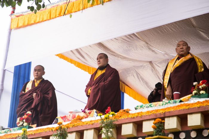 Thaye Dorje, His Holiness the 17th Gyalwa Karmapa, HE Jamgon Kongtrul Rinpoche (left), and HE Beru Khyentse Rinpoche (right) observe the Lama Dance at the Karma Temple, Dec 2016. Photo / Magda Jungowska