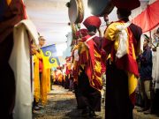 Student of His Holiness Karmapa Thaye Dorje with the Karmapa Dream Flag