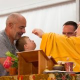 Thaye Dorje, His Holiness the 17th Gyalwa Karmapa, blessing students in France 2015. Photo / Thule Jug