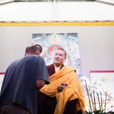 Thaye Dorje, His Holiness the 17th Gyalwa Karmapa, blessing students. Assisting is Tsultrim Namgyal, attendant to the 16th Karmapa. Photo / Tokpa Korlo