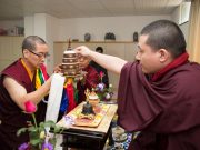 Lama Puntsok offers a mandala to Thaye Dorje, His Holiness the 17th Gyalwa Karmapa. Photo / Thule Jug