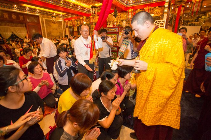 Thaye Dorje, His Holiness the 17th Gyalwa Karmapa, blessing devotees. Photo / Thule Jug