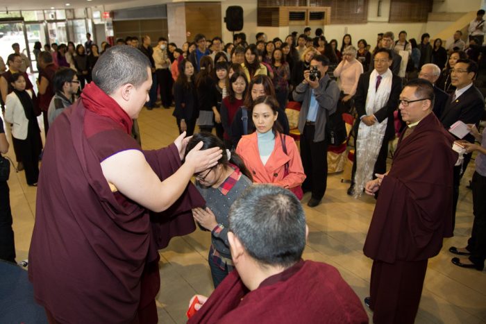 Thaye Dorje, His Holiness the 17th Gyalwa Karmapa, blessing members of the public in Changhua, Taiwan. Photo / Thule Jug