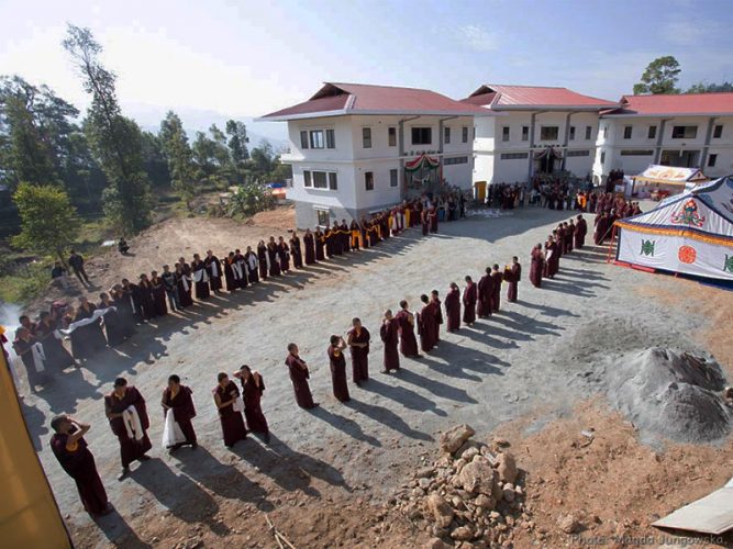 Monks waiting for Thaye Dorje, His Holiness the 17th Gyalwa Karmapa, at the Karmapa Center for Education. Photo / Magda Jungowska