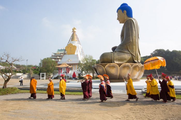 Relics of Shamar Rinpoche are carried in a long ceremonial procession around the grounds and put inside a stupa in the Tathagata Hall. Photo / Thule Jug